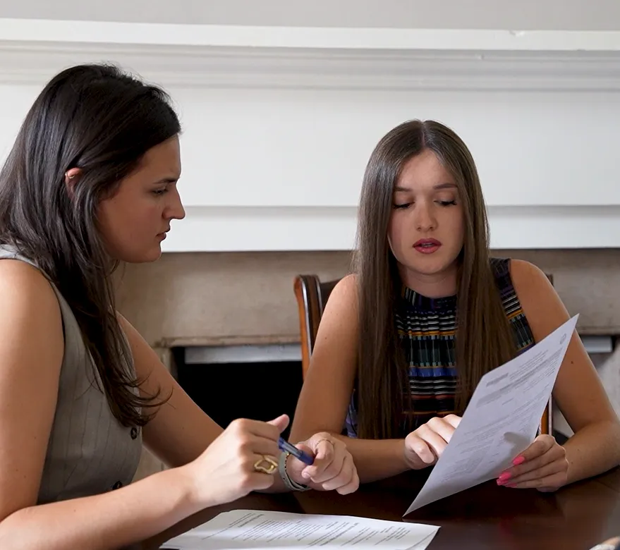 MIP employees in office with client